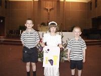 Catriona's first communion, with Colin and Graham