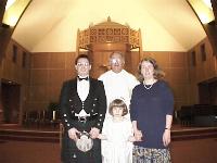 Catriona's first communion, with us and Father Rock